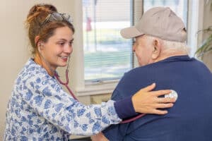 A nurse with a resident at Circleville Post-Acute