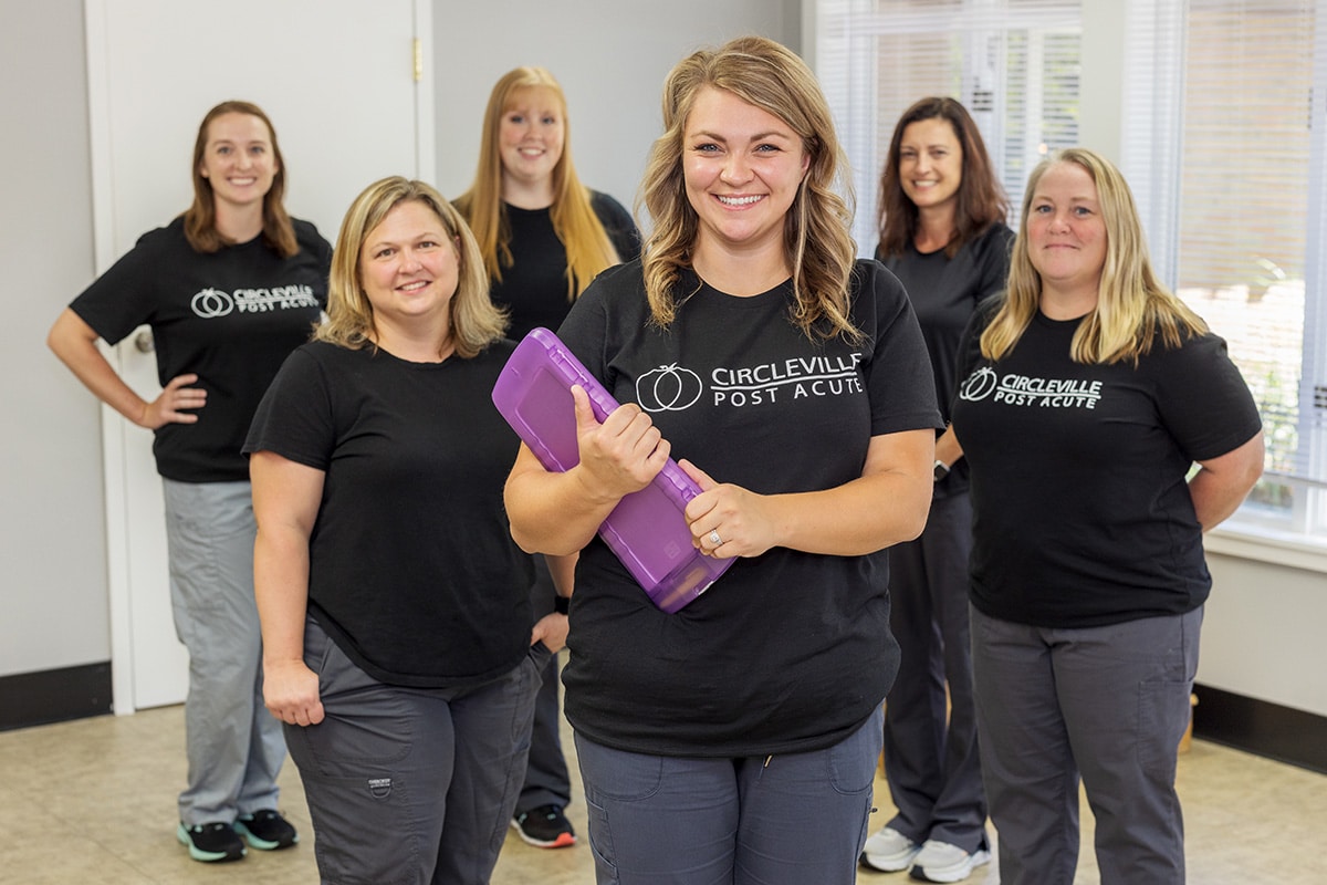 Several nurses in the hallway at Circleville Post-Acute
