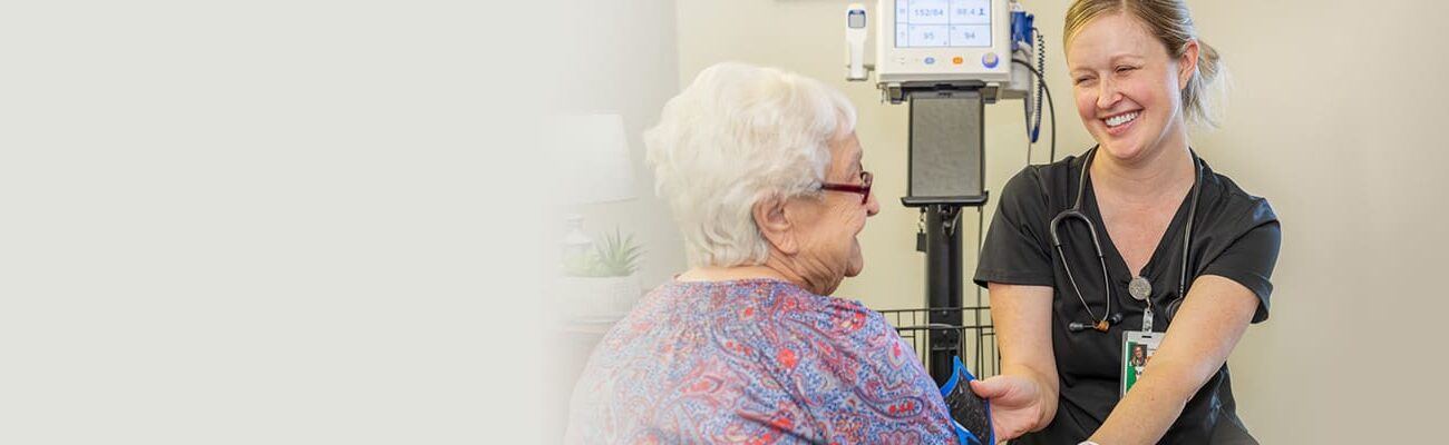A nurse with a resident at Circleville Post-Acute